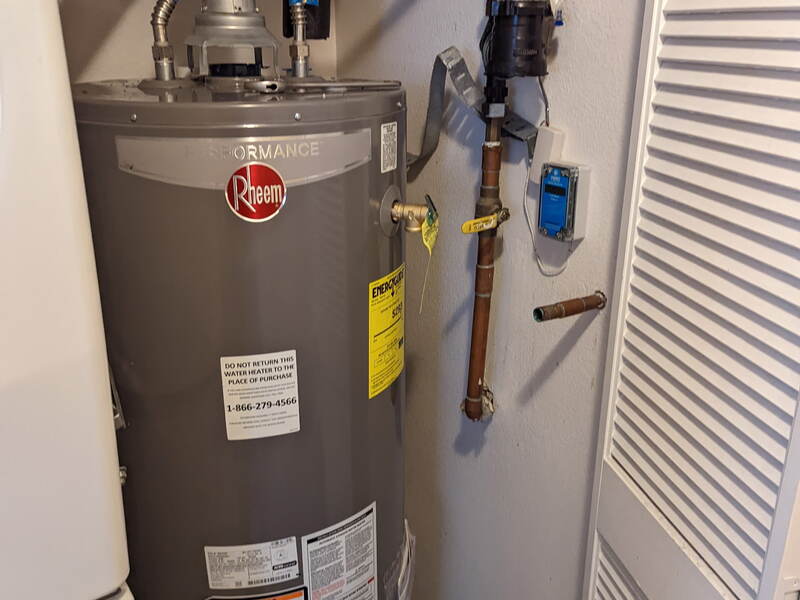 Water Heater Replacement — Rheem Performance unit, full plumbing hookup